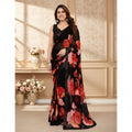 AANCHAL black georgette ready-to-wear saree with a bold red and pink floral print. Features a sleeveless blouse and elegant drape.