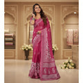 AANCHAL pink faux linen ready-to-wear saree with white floral print and decorative border. Lightweight and elegant for festive occasions.