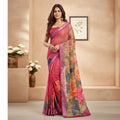 AANCHAL pink faux linen ready-to-wear saree with a vibrant floral print and purple border. Model is wearing a sleeveless blouse.